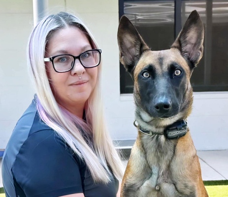 a woman with a dog