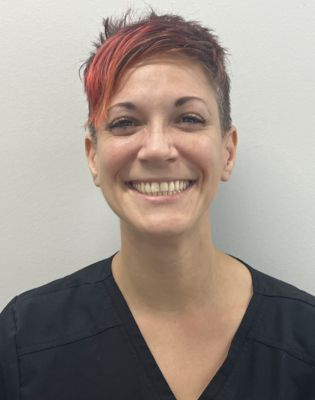 a woman smiling at the camera