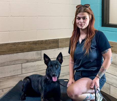 a woman with a dog