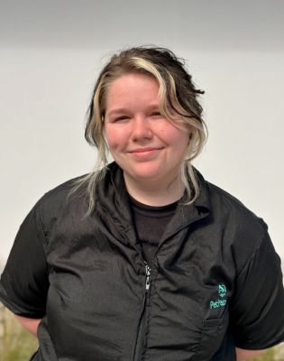 a woman in a black jacket