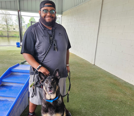 a man with a dog